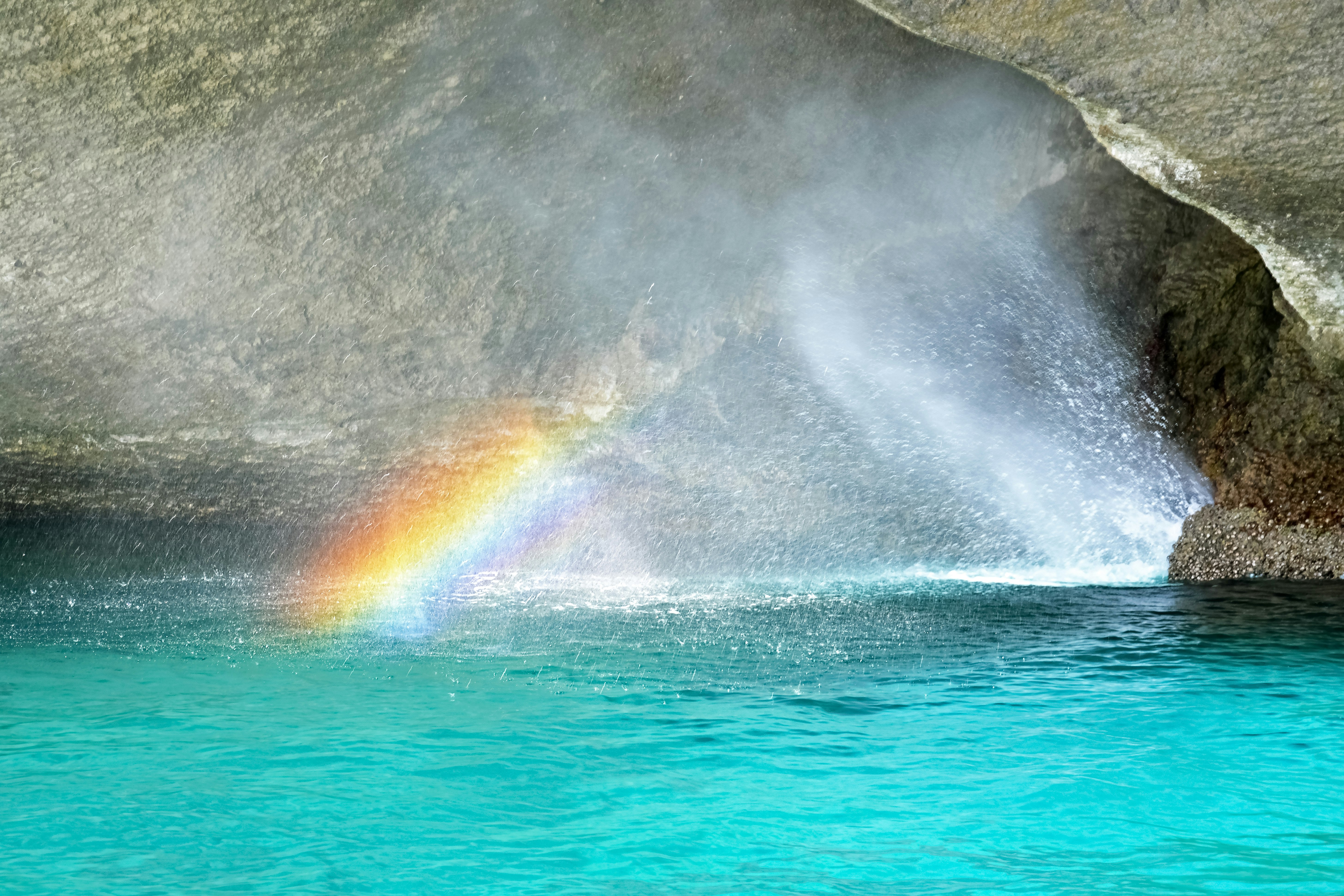 ocean waves crashing on shore during daytime